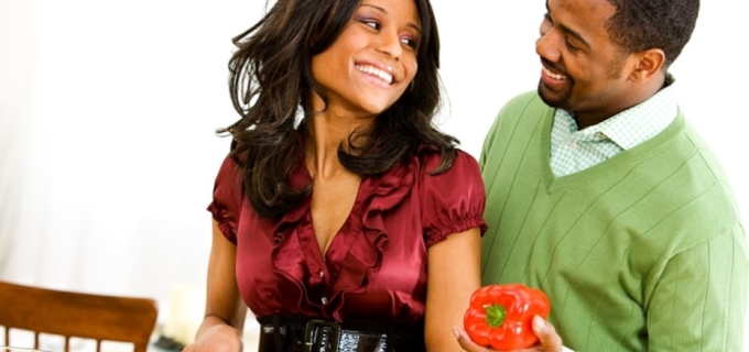 couple dressed in holiday attire at holiday dinner table